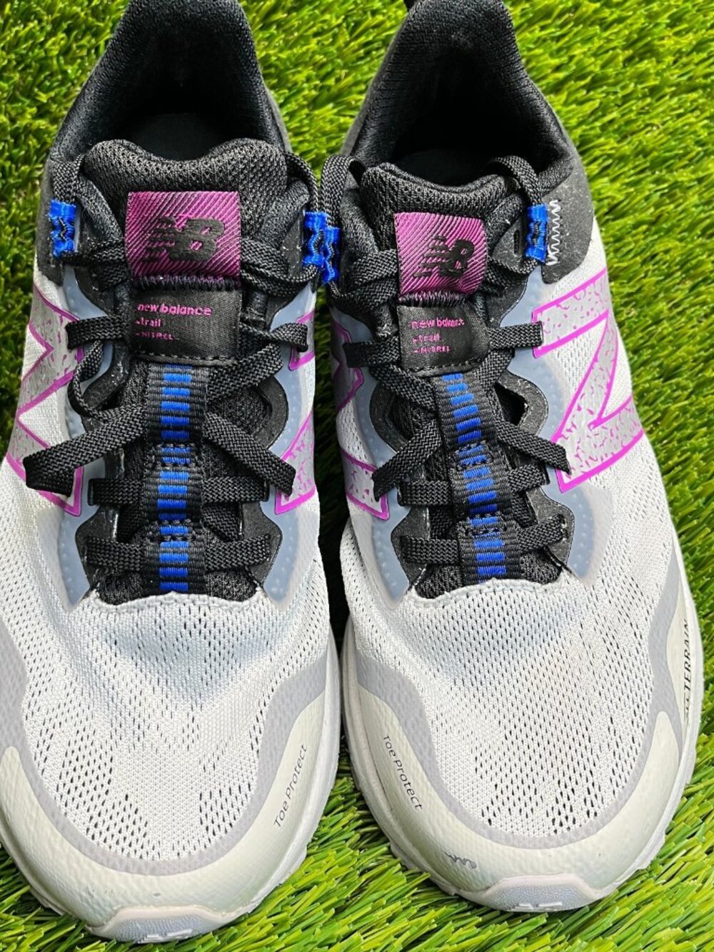 New Balance Women's White, Black & Pink All-Terrain Sneakers - Picture 6 of 11